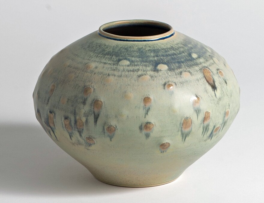 This large table top hand-thrown vase is available in the Rookwood Pottery catalog.