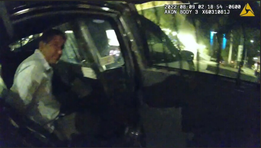FILE - This Aug. 9, 2020, still image taken from officer video provided by the Albuquerque Police Department shows the arrest of Muhammad Syed. Syed, the main suspect in the slaying of four Muslim men in Albuquerque has committed regular acts of violence in the six years since he fled war-ravaged Afghanistan and resettled in the United States, according to police documents and court records. (Albuquerque Police Department via AP, File)