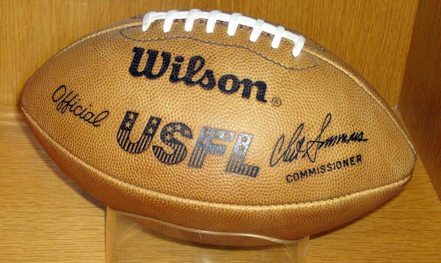 A game ball from the original, 1980s incarnation of the United States Football League on display in the Pro Football Hall of Fame.