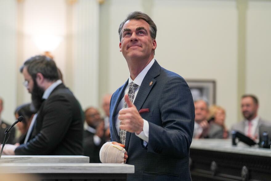 Gov. Kevin Stitts gives a thumbs up to the gallery during his 2026 State of the State address.