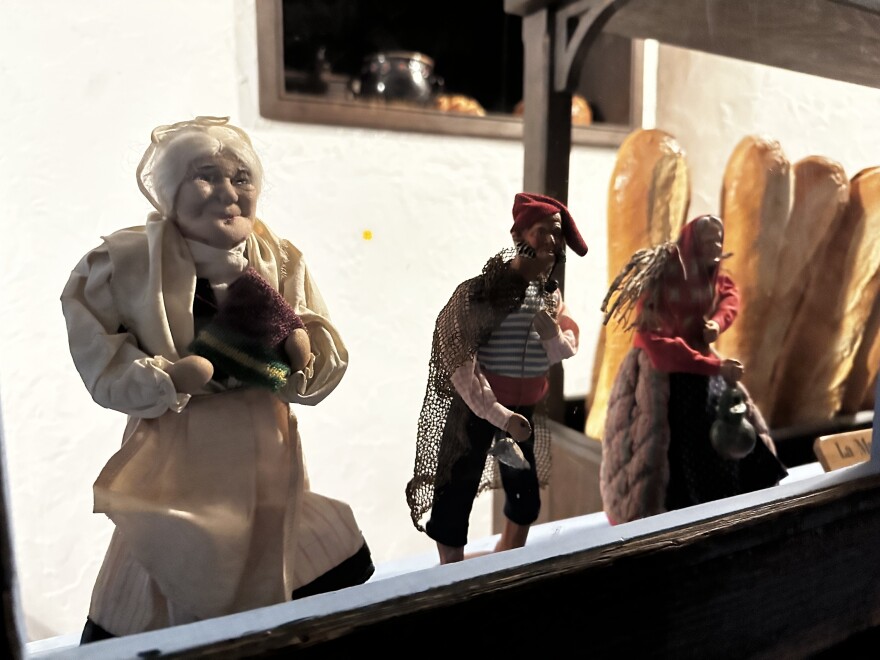 Handmade holiday figurines decorate the windowsill of a Bavarian-themed home at the Milwaukee Public Museum's European Village.