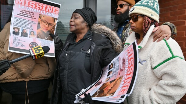 The adopted family of La'Niyah "Lala" Clark stand outside the Wilkes-Barre Police Department, including, from left: grandmother Carmen Tinson, father Antione Clark, and mother Ameerah Woods.