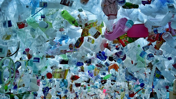 An array of consumer plastic items such as water bottles, jugs, and bags.