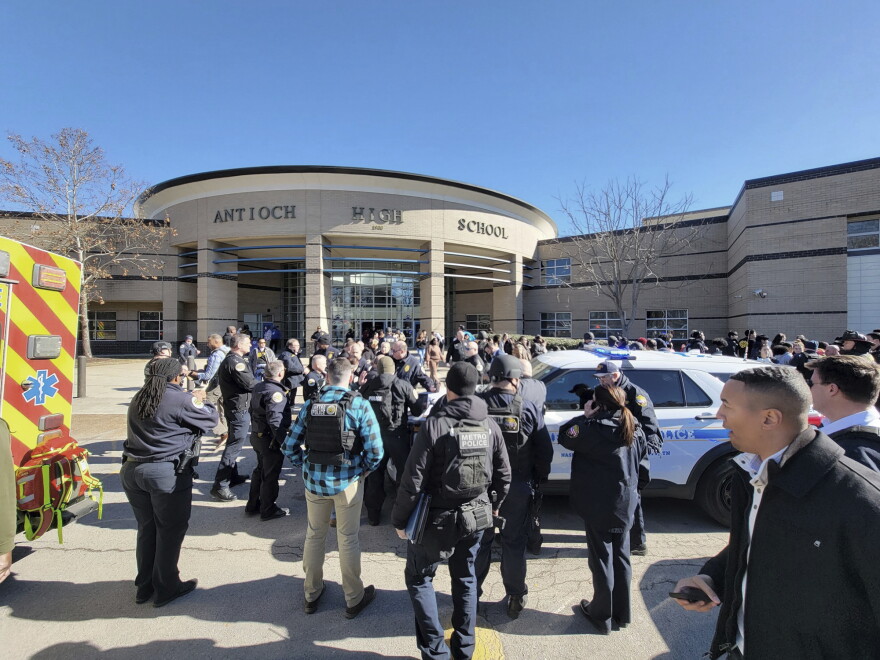This photo provided by Metro Nashville Police, emergency personnel gather outside Antioch High School after a shooting incident on Wednesday, Jan. 22, 2025 in Nashville, Tenn. (Metro Nashville Police via AP)