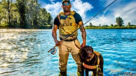 Chad Brown with his dog Axe on the Willamette River, Oregon. (Courtesy of Chad Brown)