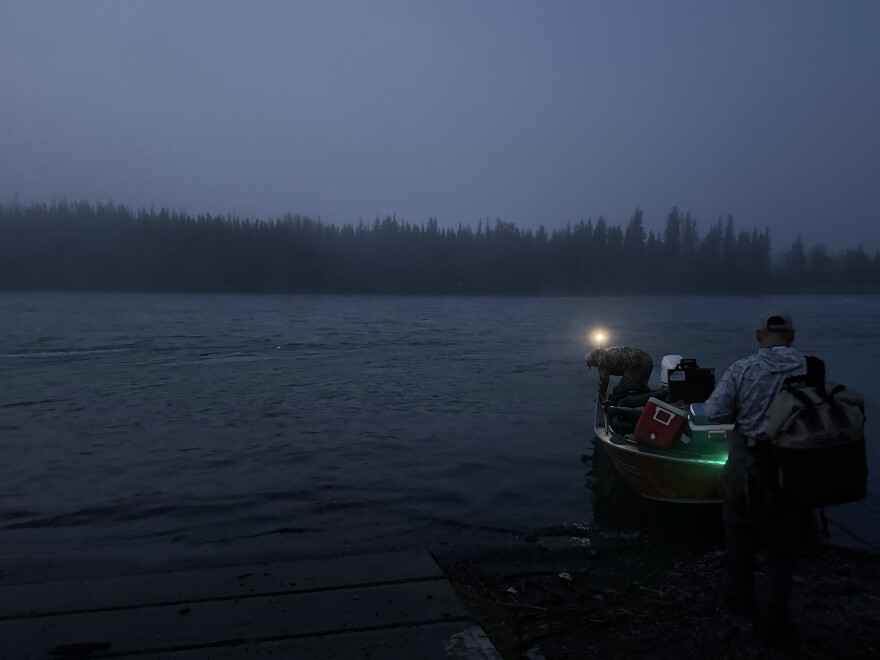 Monte Roberts (rear) prepares his boat for a guided salmon trip on Tuesday, Aug. 11, 2026 in Soldotna, Alaska.