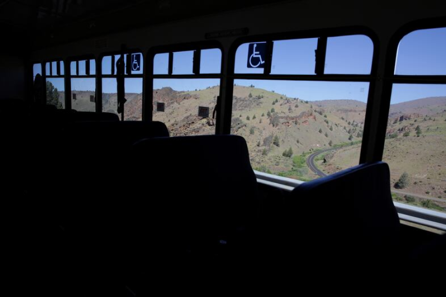 The view from inside a bus looking out at the Warm Springs Reservation.