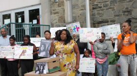 Salko Valerio speaking at a rally outside the Binghamton City School District building. June 18, 2019 (Celia Clarke/WSKG)