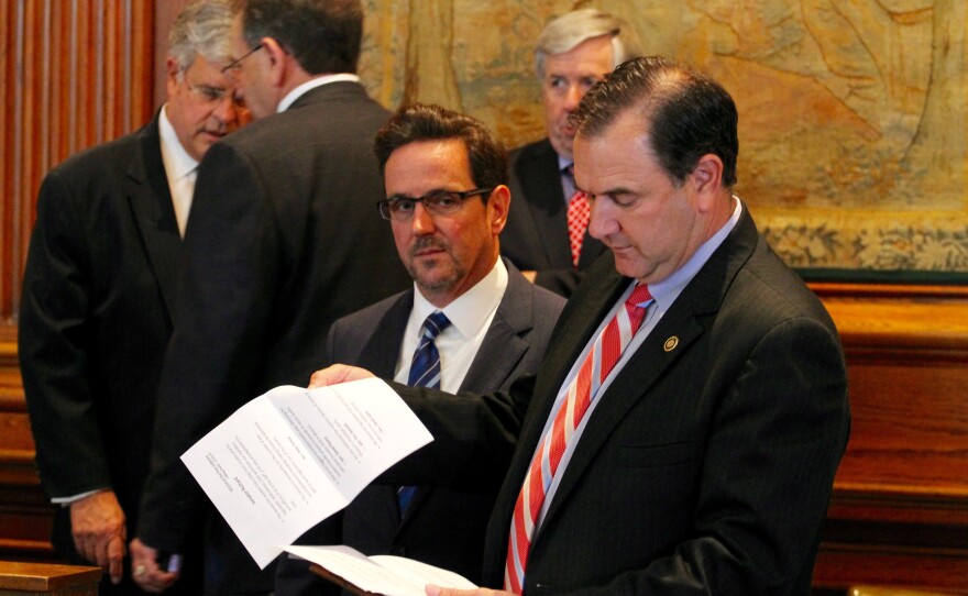 From center: Sens. Kurt Schaefer, R-Columbia, waits for a presser to start with Sen. Mike Kehoe, R-Jefferson City.