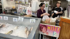 Xuan Le, left, recently bought Nana's Seafood Mart, located a mile from Asian Corner Mall. She and her granddaughter, Stephanie Dinh, are adding pho to the menu.