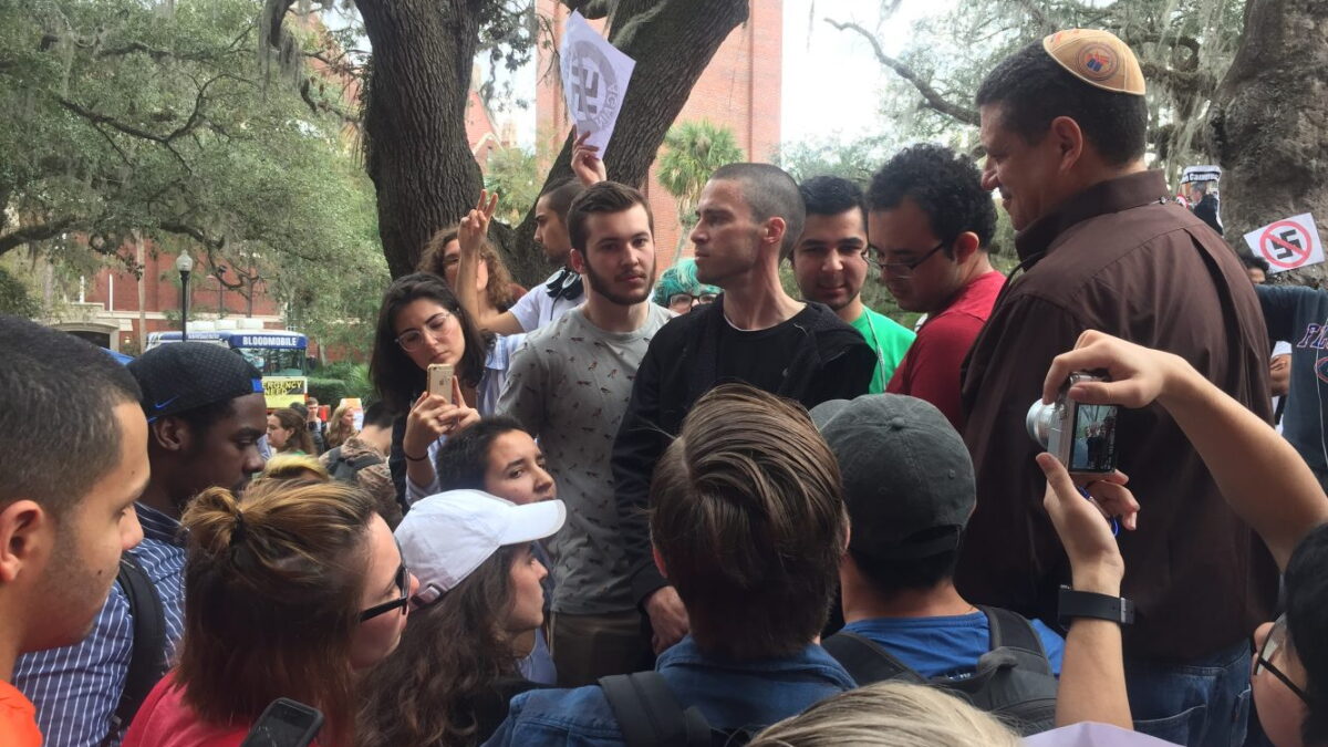 Man Wearing Swastika Explains Why He Came To Turlington Plaza