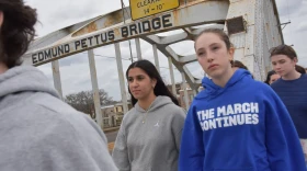 Miriam Mohamed (center left) and her classmates crossed the Edmund Pettus Bridge in Selma, Alabama, in March 2025. The bridge was the launch point of the 1965 Voting Rights March and site of the violent Bloody Sunday confrontation with police a few days earlier.