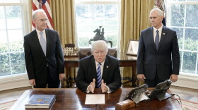 President Donald Trump reacts with HHS Secretary Tom Price (left) and Vice President Mike Pence (right) after Republicans abruptly pulled their health care bill from the House floor, in the Oval Office of  the White House on March 24, 2017 in Washington. (Olivier Douliery-Pool/Getty Images)