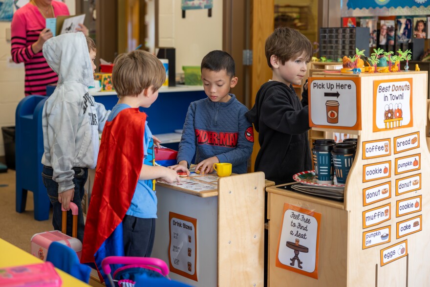 Kids playing in a classroom