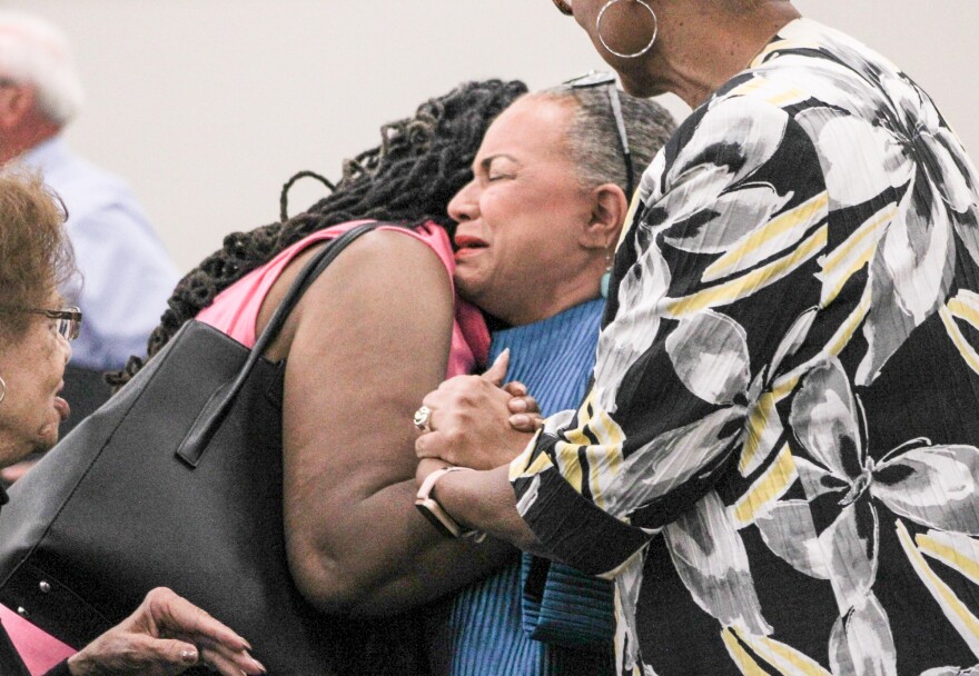Sheila Brown-Kinnard receives congratulations from friends and community members after being selected for the Wichita Board of Education on Friday.