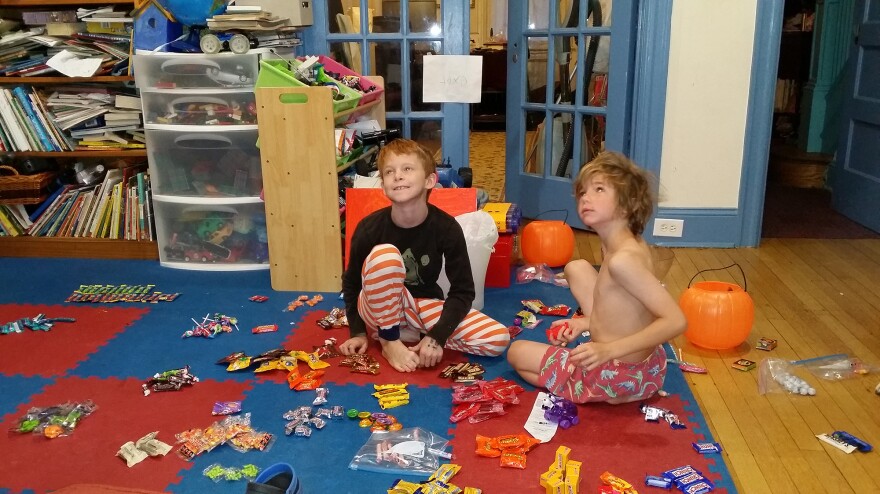 The morning after Halloween, the first thing the kids did was start eating Halloween candy — and then they began to sort it in preparation for the candy buyback.