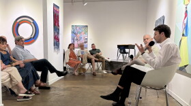 William Bardin, right, and Steve Green discuss the history of Craighead Green Gallery and its future as Bardin Gallery at an August event.