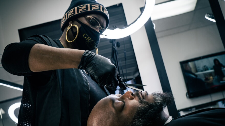 Mischell Thompson is a barber, a mother and a gun owner.