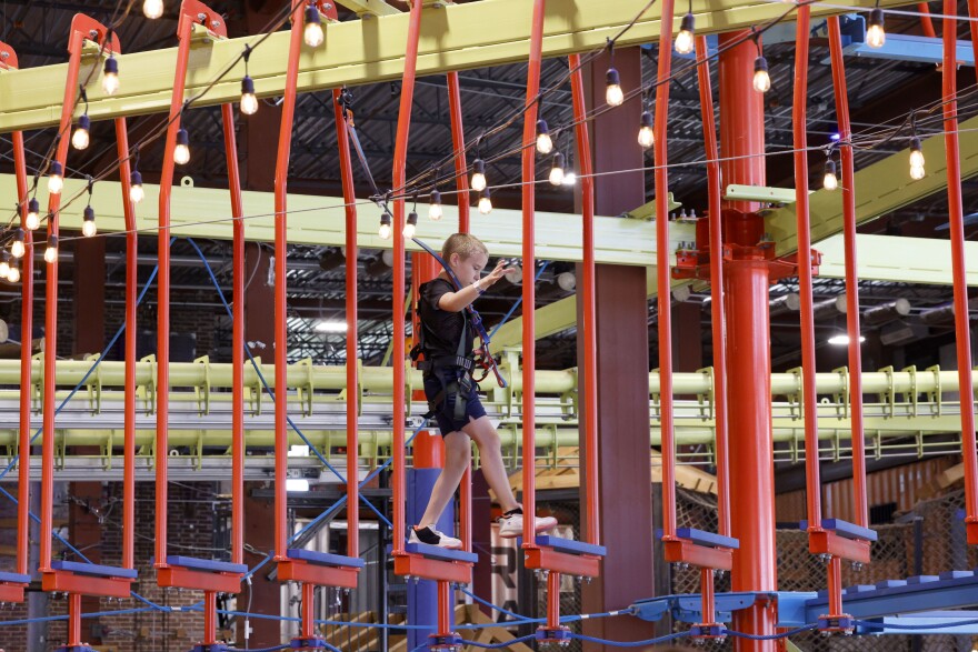 A boy plays at Fritz's Adventure, Friday, July 18, 2025, in The Colony.