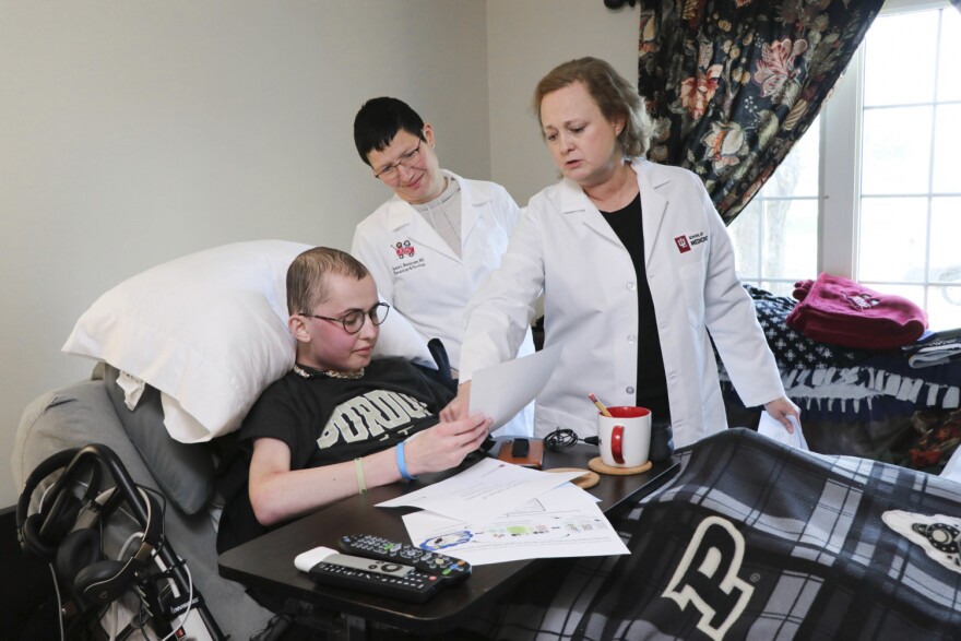 Tyler Trent speaks with Indiana University researchers at his home, one month before his death.