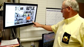 Delta County Sheriff Gerald Teague explains the monitoring hub for the security cameras that are located in the Courthouse and Jail.