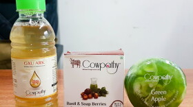 Some of the products on sale at Umesh Sonia's boutique in Mumbai include bottles of distilled cow urine, soap made from cow dung, floor disinfectant made from cow urine, under-eye gel and toothpaste made from cow excrement. This is part of a growing retail market in India.