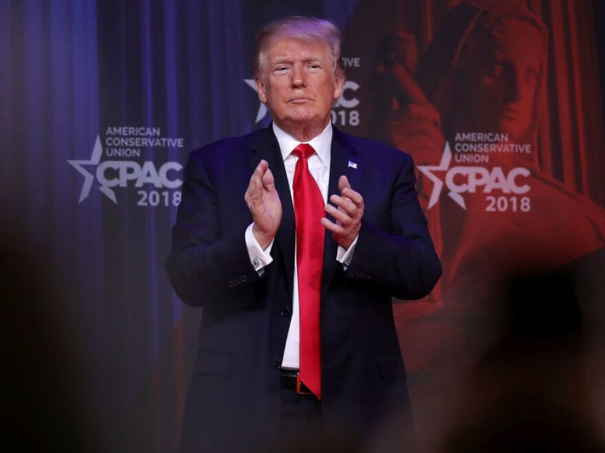 President Trump leaves the stage after addressing the Conservative Political Action Conference. He has repeatedly called for arming teachers after the school shooting in Florida.