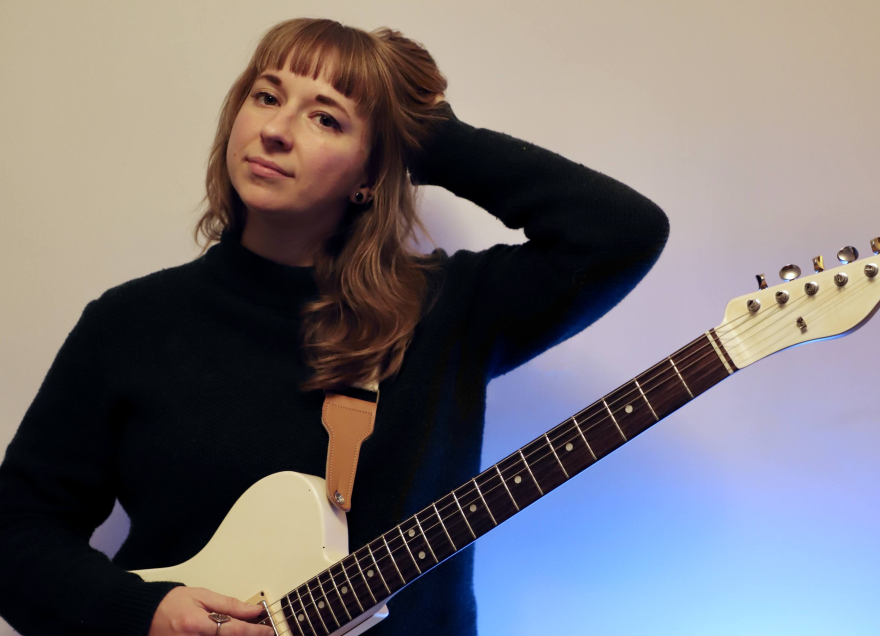 Bethany Svoboda poses with guitar