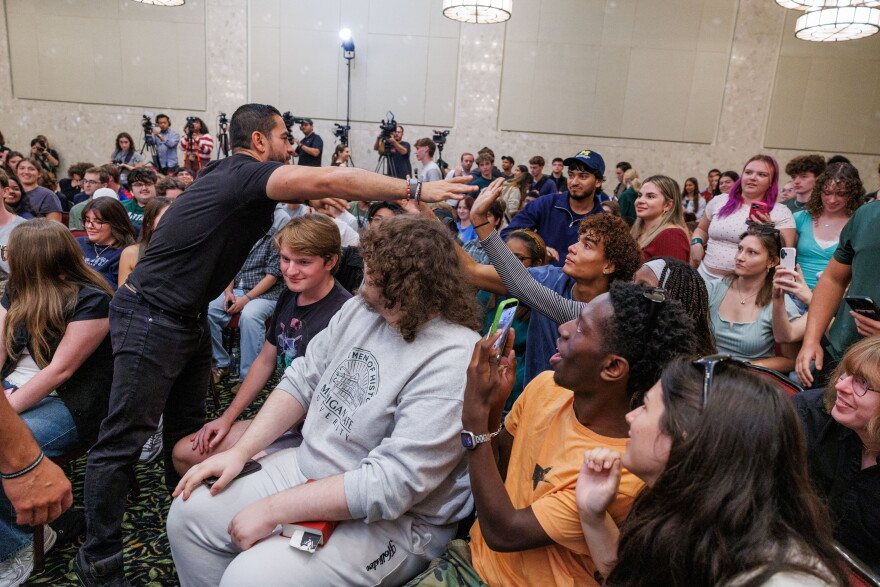 Democratic nominee for U.S. Senate Abdul El-Sayed mingles with Michigan State University students after a town hall in East Lansing, Mich., on Sept. 11, 2026.