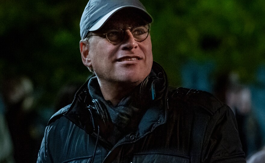 Filmmaker Aaron Sorkin isn't bothered by critics who say his writing style is too idealistic. "I get to earn a living doing exactly what I love doing," he says.