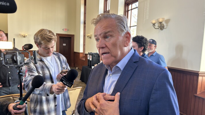 Former congressman Mike Rogers, Republican candidate for Michigan's open U.S Senate seat, takes questions from the press at a business event in Traverse City on Friday, Oct. 23, 2026