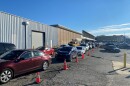 Cars line up at a StarMed COVID-19 testing site on Tuckaseegee Road in west Charlotte.