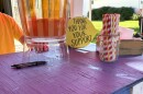 Kids at Wiggles and Giggles home daycare run a lemonade stand in support of United Way of Cass Clay's annual school supply drive.