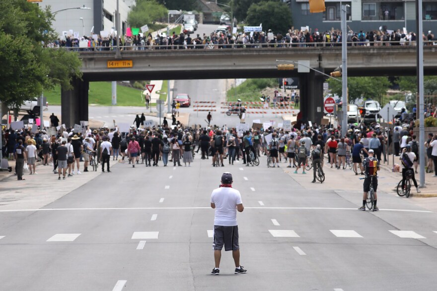 Demonstrators protesting police brutality marched onto I-35 from Austin Police headquarters on Saturday.