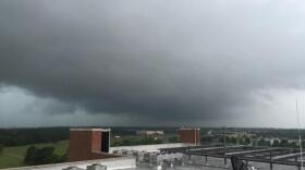 A wall cloud lowers over Purcell south of the National Weather Center in Norman Tuesday afternoon.