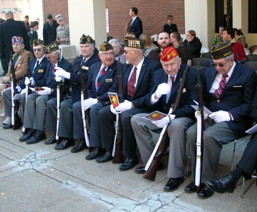 Veterans at ease in front of Powell Student Center at Eastern Kentucky University in Richmond.