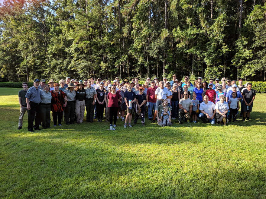 Volunteers and park staff pose for a group photo at Maclay Gardens State Park before Saturday's cleanup.