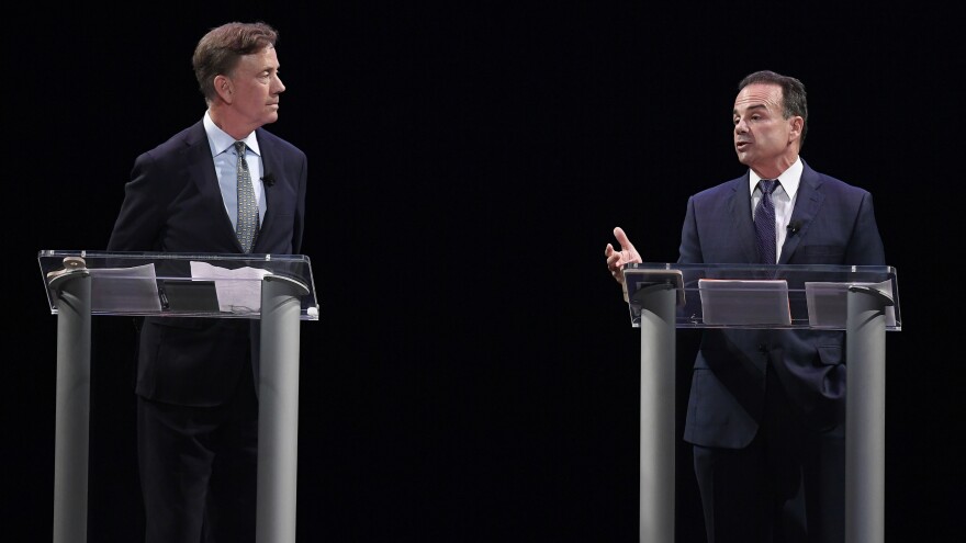 Democratic candidates for governor Ned Lamont and Bridgeport Mayor Joe Ganim debate in New Haven, Conn., last month.