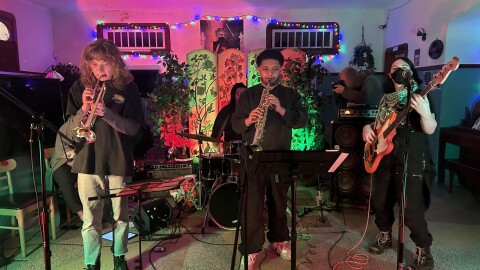Clementine Hartman (right), who performs as Klezlie Feinberg, with her band Labia Menorah at Okay Bar in New Orleans on Dec. 15, 2025.