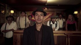 Fernando Serrano, who plays a striking miner in "Bisbee '17," a story of nearly 2,000 miners, most of them immigrants, were pulled violently from their homes and businesses in Bisbee, Ariz., for deportation to the New Mexico desert in 1917. (Jarred Alterman/4th Row Films via AP)