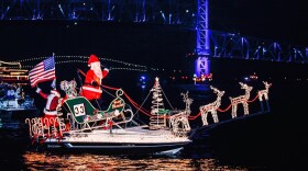 Santa and his reindeer glow on this boat during a recent Jacksonville Light Boat Parade