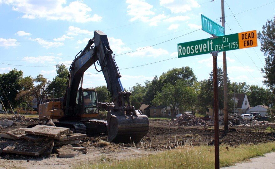 Brick quadplexes on Roosevelt Court are demolished to make way for luxury student apartments south of Wichita State's campus.