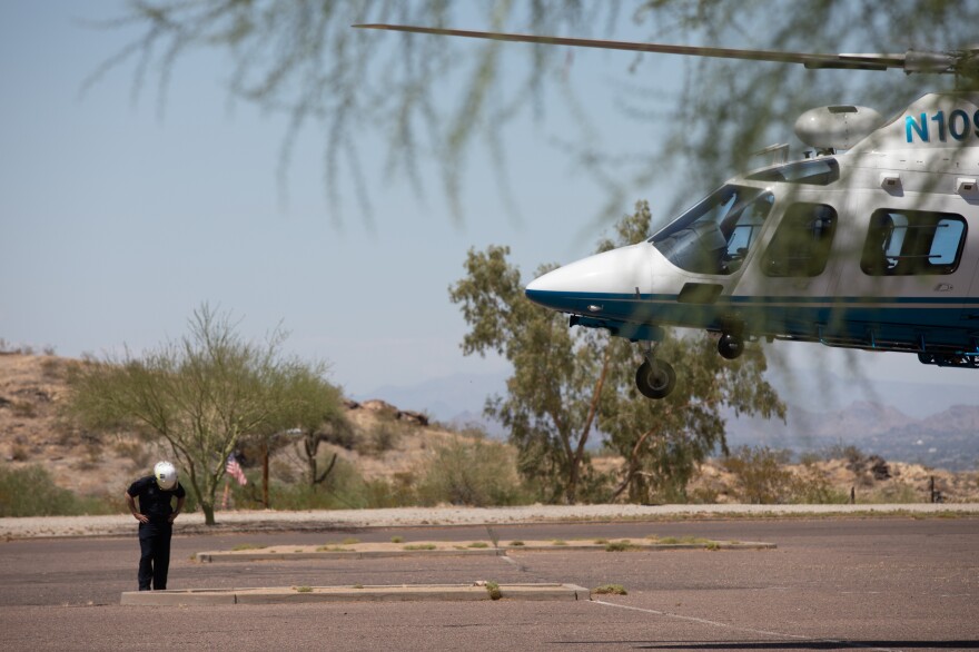 For rescue workers, like these firefighters who do mountain rescues in Phoenix, extreme heat makes responding to distress calls particularly dangerous.