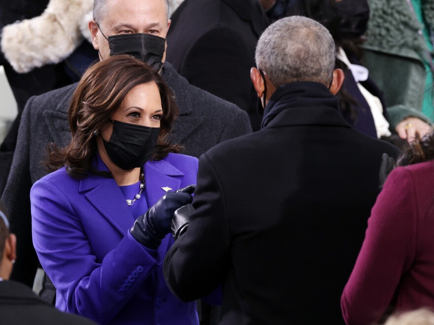 U.S. Vice President-elect Kamala Harris and husband Doug Emhoff greet former U.S. President Barack Obama as they arrive to the inauguration of U.S. President-elect Joe Biden on the West Front of the U.S. Capitol on Wednesday.