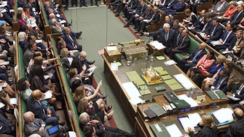Prime Minister Boris Johnson (center right) gestures during his first Prime Minister's Questions in London Wednesday. The U.K.'s House of Commons voted to block a no-deal Brexit, prompting Johnson to call for a general election next month — which was also voted down.