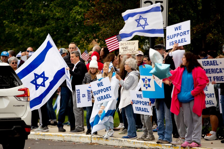 Nearly 200 people gather in support of Israel on Sunday, Oct. 15, 2023, during a rally at the Jewish Federation of St. Louis in Creve Coeur, Mo.