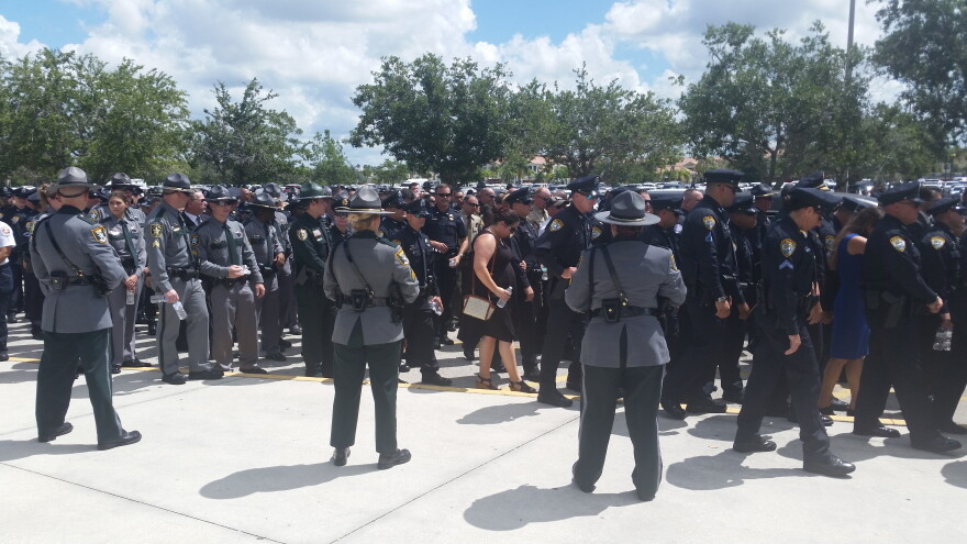 Law Enforcement Officers from across Florida converge outside Germain Arena