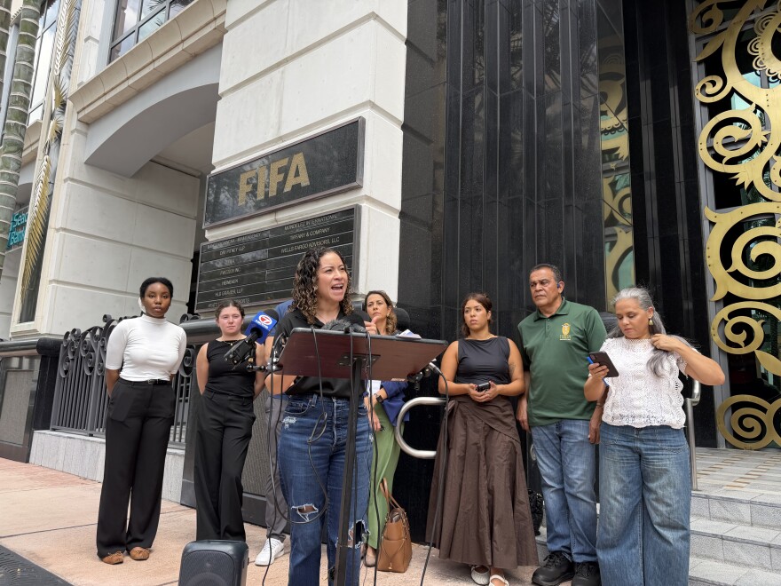 Yareliz Mendez-Zamora speaks at press conference outside of FIFA Headquaters.
