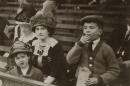 Helene Britton in the baseball stands with her children, Marie and Frank DeHaas Britton. She sold the St. Louis Cardinals in 1918, before being able to pass the team to her son.