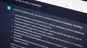 In this photo illustration, the OpenAI "ChatGPT" AI-generated answer to the question "What can AI offer to humanity?" is seen on a laptop screen in London, England.